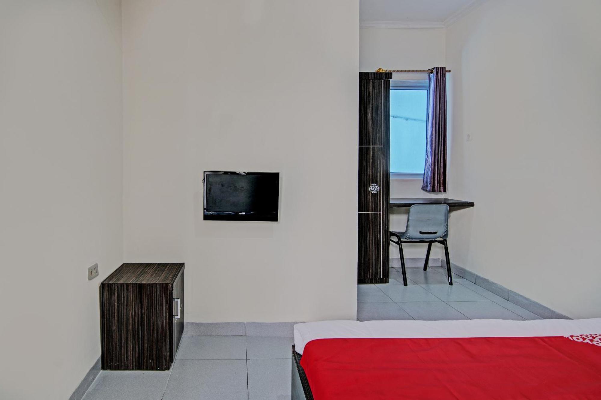 Hotel Oyo 92530 Rosela House Syariah Pekanbaru